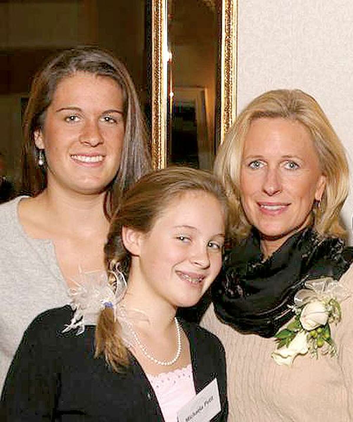 17-year-old Hayley, 11-year-old Michaela and Jennifer Hawke-Petit in an undated family photo.
