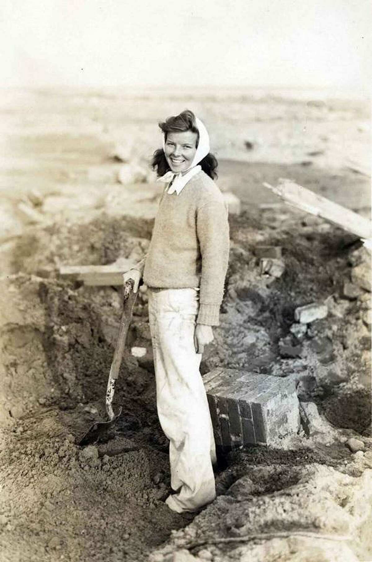 Kate Hepburn during the building of her home in Old Saybrook after her previous home was destroyed in the hurricane of 1938.