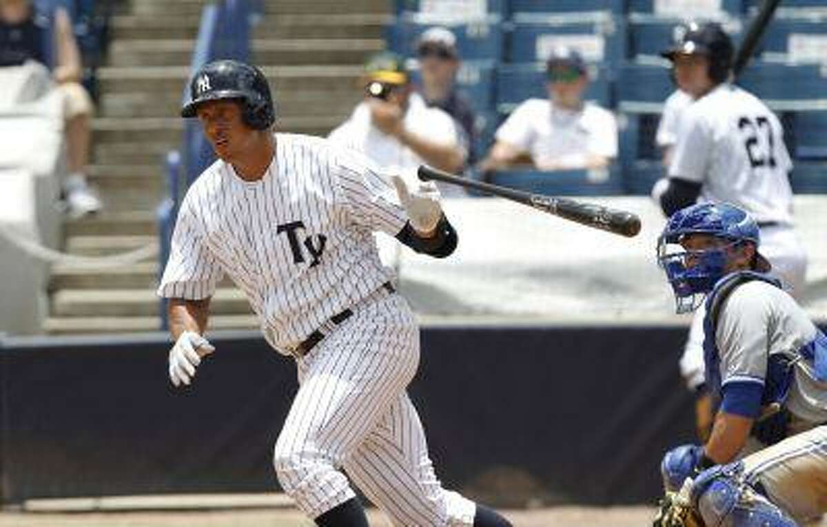 New York Yankees' Alex Rodriquez drops the bat as he heads for first with a single in the sixth inning for the Tampa Yankees against the Dunedin Blue Jays in a minor league baseball rehab game in Tampa, Fla., Wednesday, July 10, 2013.