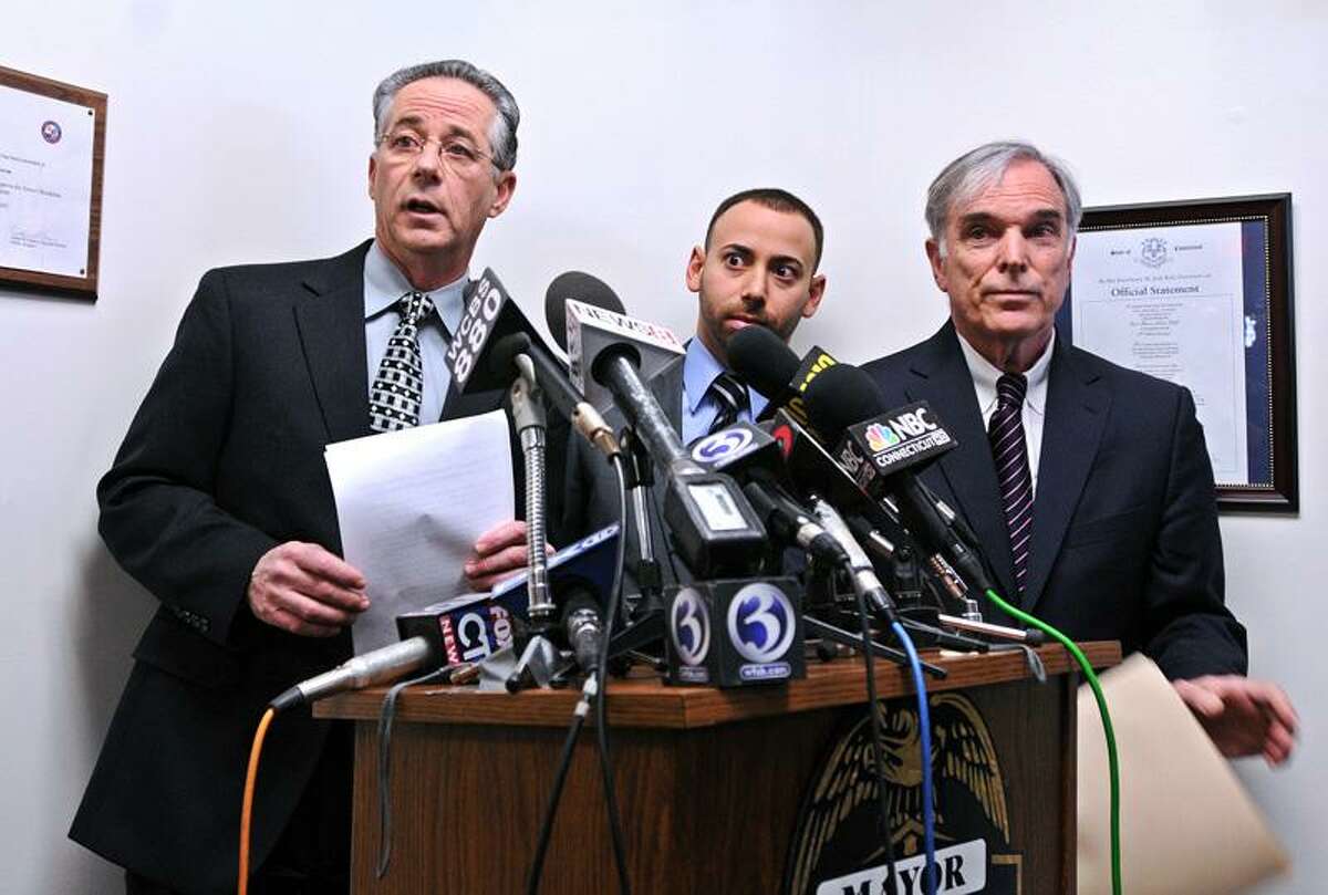 East Haven--East Haven mayor Joseph Maturo, Jr., left, along with town attorney, Joseph Zullo, center, and attorney Jonathan J. Einhorn announce the retirement of embattled East Haven police chief Leonard Gallo during a press conference at Town Hall. Einhorn is the attorney representing Gallo in his pending civil suit and will represent him if further indictments are to come from the US Attorney's office and FBI. Peter Casolino/New Haven Register01/30/12