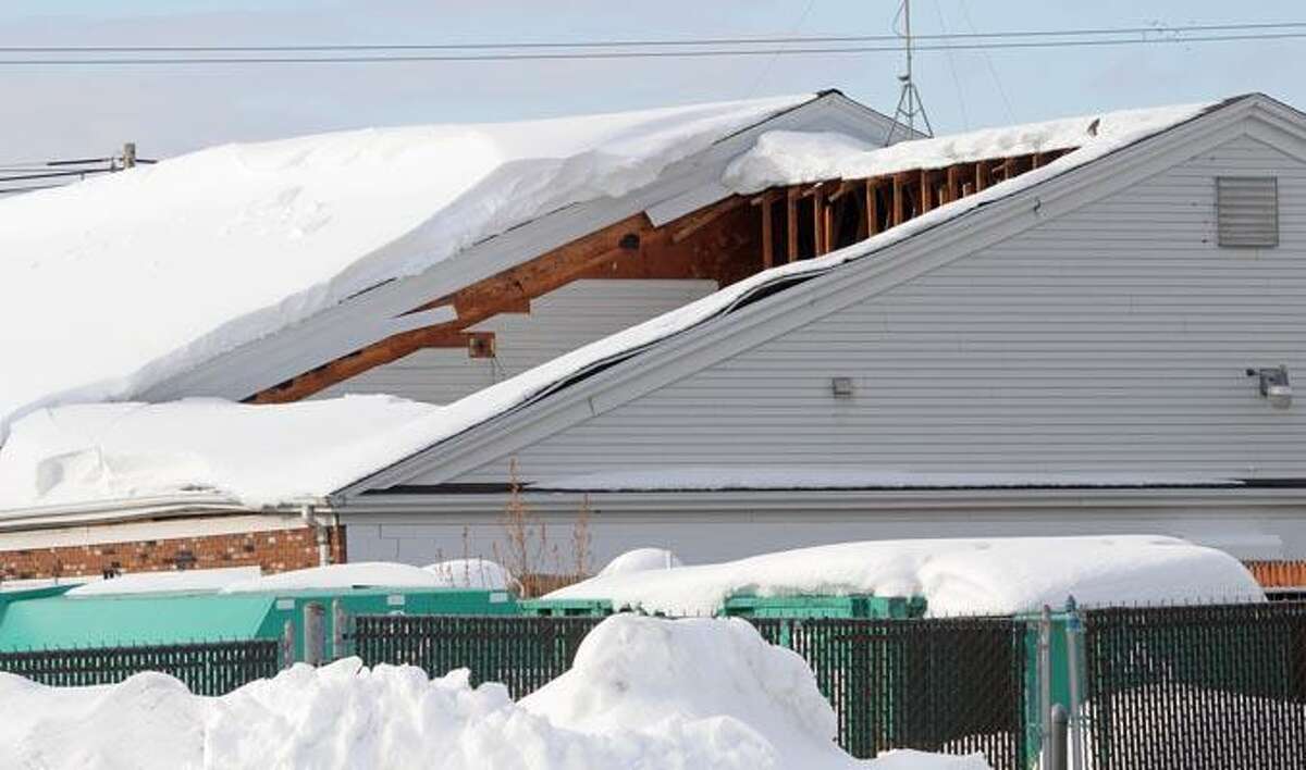 Heavy snowfall collapses roofs in North Branford, North Haven