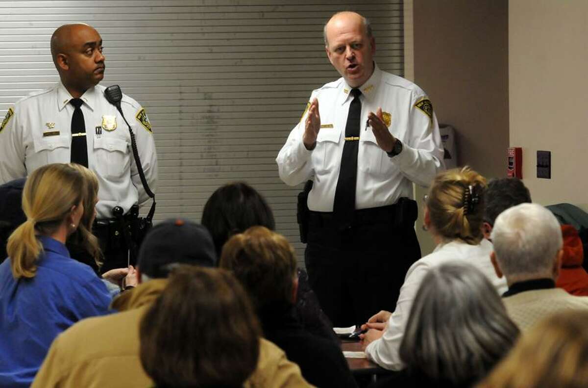 Worthington Hooker School in New Haven was the site for an East Rock community meeting with Police Lt. Thad Reddish left and New Haven Police Chief Dean Esserman. Photo by Mara Lavitt/New Haven Register1/23/12