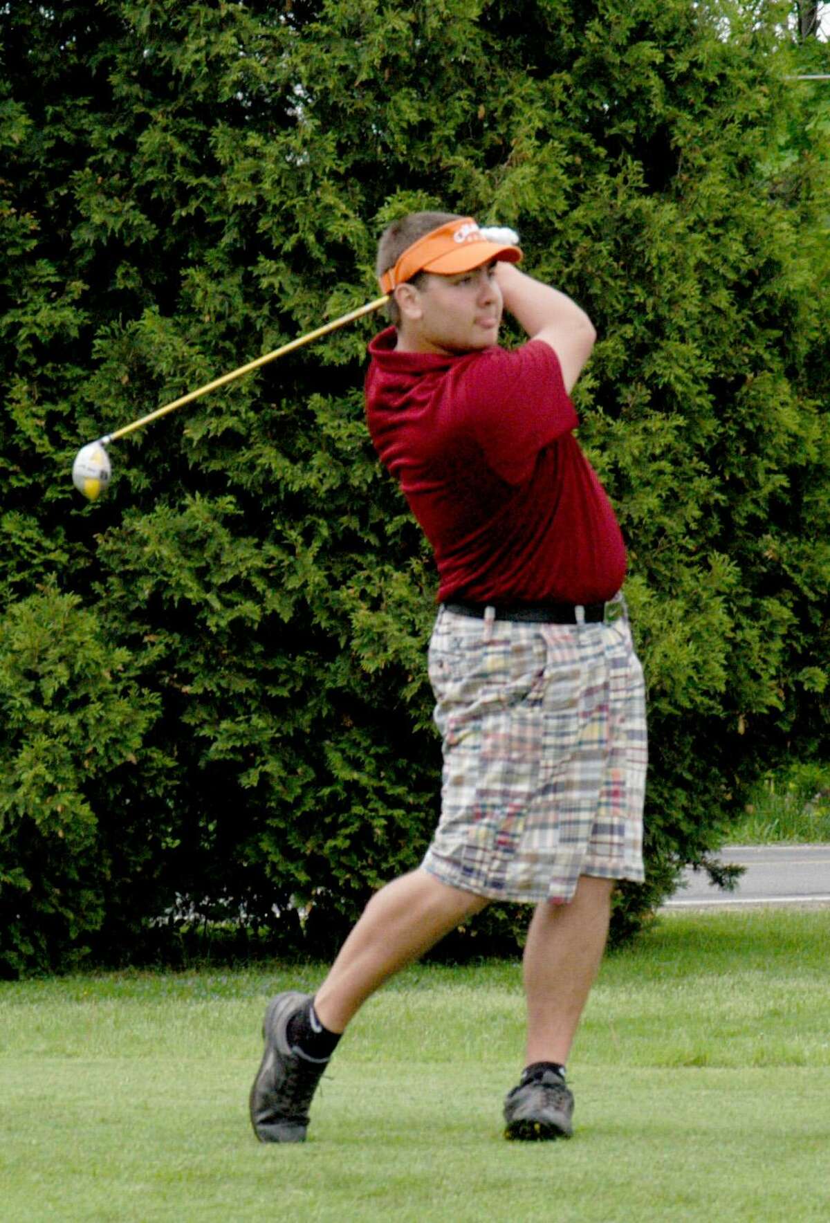 Dispatch Staff Photo by DAVID M. JOHNSON Canastota's Ian Campbell tees off on the first hole in the Section III Class C tournament at Oneida Community Golf Club on Monday.