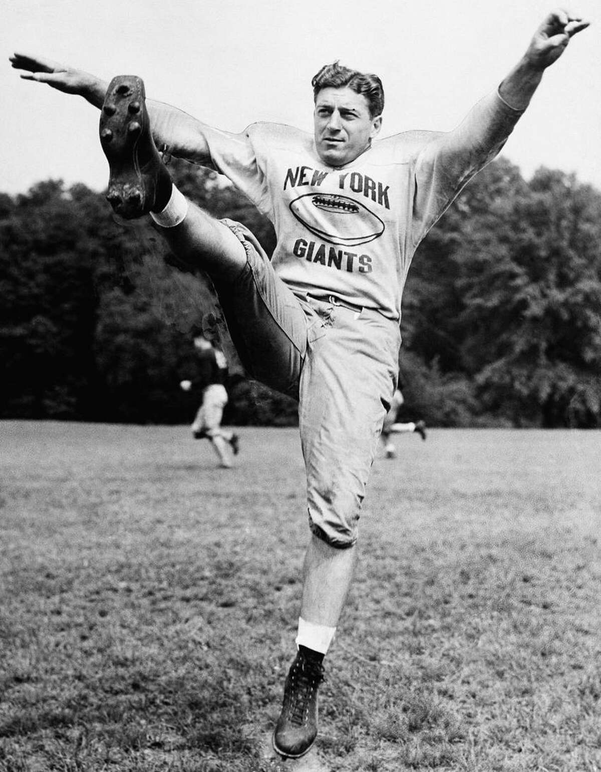 New York Giants' Ken Strong during a practice kick, Sept.13, 1939 . (AP Photo)