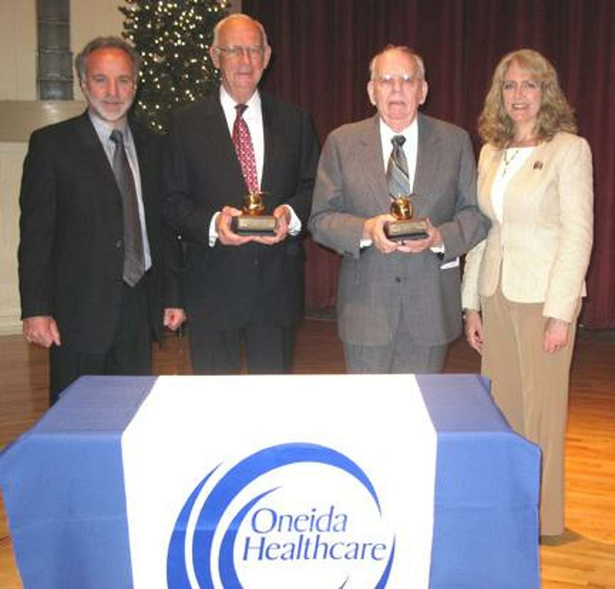 Pictured from left: Gene Morreale, president and CEO of Oneida Healthcare; James J. Devine Jr.; James L. Crowley; and Joanne Ernenwein, director of development Oneida Healthcare Foundation.