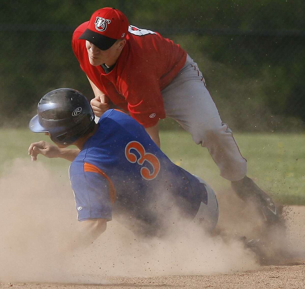 Dispatch Staff Photo by JOHN HAEGEROneida's Dylan VanDresar (3) is tagged out a second on the steal by VVS Cole Barbano (6) in the bottom of the first inning of play on Thursday, May 12, 2011 in Oneida.