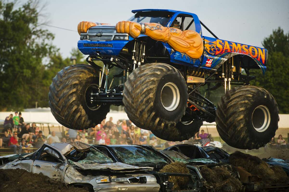 Rick Steffens of Ohio becomes airborne as he races his monster truck, Samson, during a monster truck rally on Wednesday, August 16, 2017 at the Midland County Fairgrounds.
