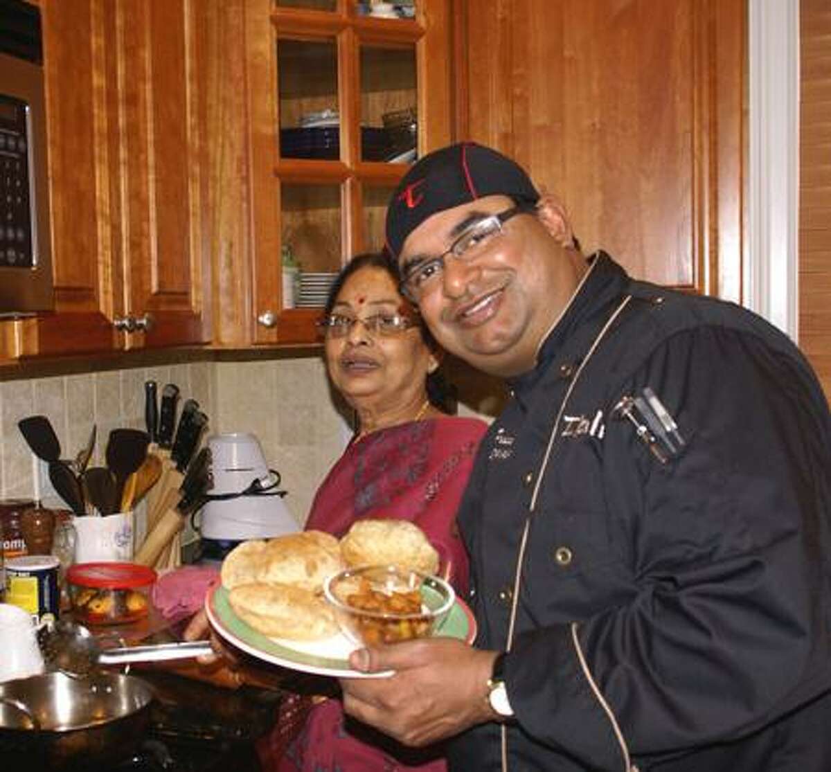 Contributed photo: Restaurateur Prasad Chirnomula, who owns Thali, Thali Too and Oaxaca Kitchen in New Haven, as well as three other restaurants in Connecticut, says there's no better cook than mom, Laxmi Chirnomula of Stamford.