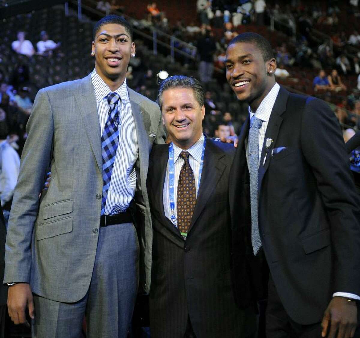 ASSOCIATED PRESS Kentucky head coach John Calipari, center, stands with former players Anthony Davis, left, and Michael Kidd-Gilchrist, right, before the NBA Draft on Thursday night at the Prudential Center in Newark, N.J. Davis was selected the No. 1 overall pick by the New Orleans Hornets, and Kidd-Gilchrist was selected No. 2 by the Charlotte Bobcats.