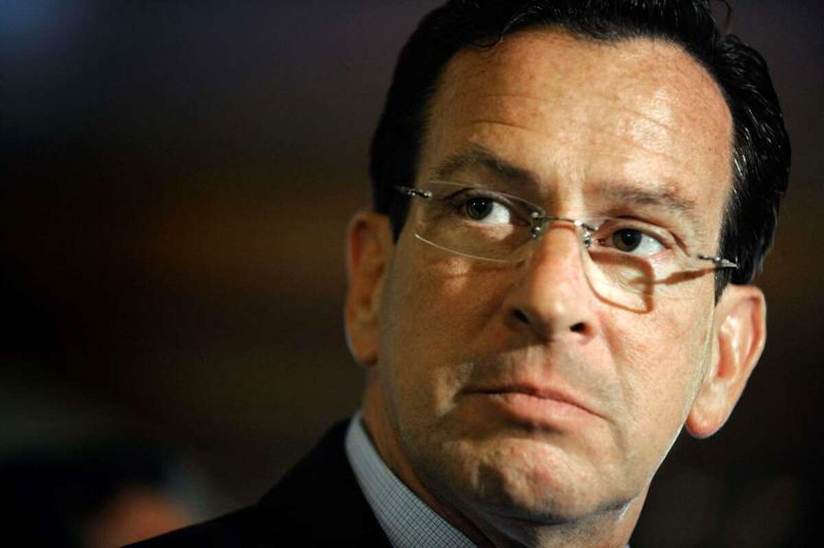 Gov. Dannel P. Malloy speaks to the media at the Capitol in Hartford Friday.(Associated Press)