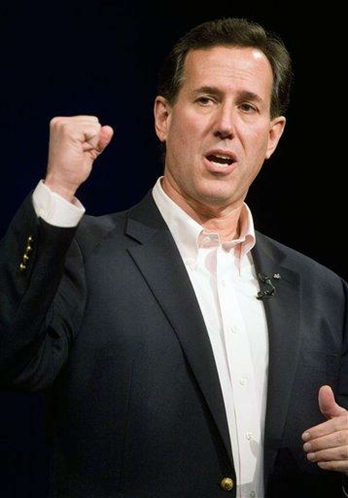 Republican presidential candidate and former U.S. Senator Rick Santorum campaigns at a tea party town hall meeting Saturday in Hixson, Tenn. Associated Press