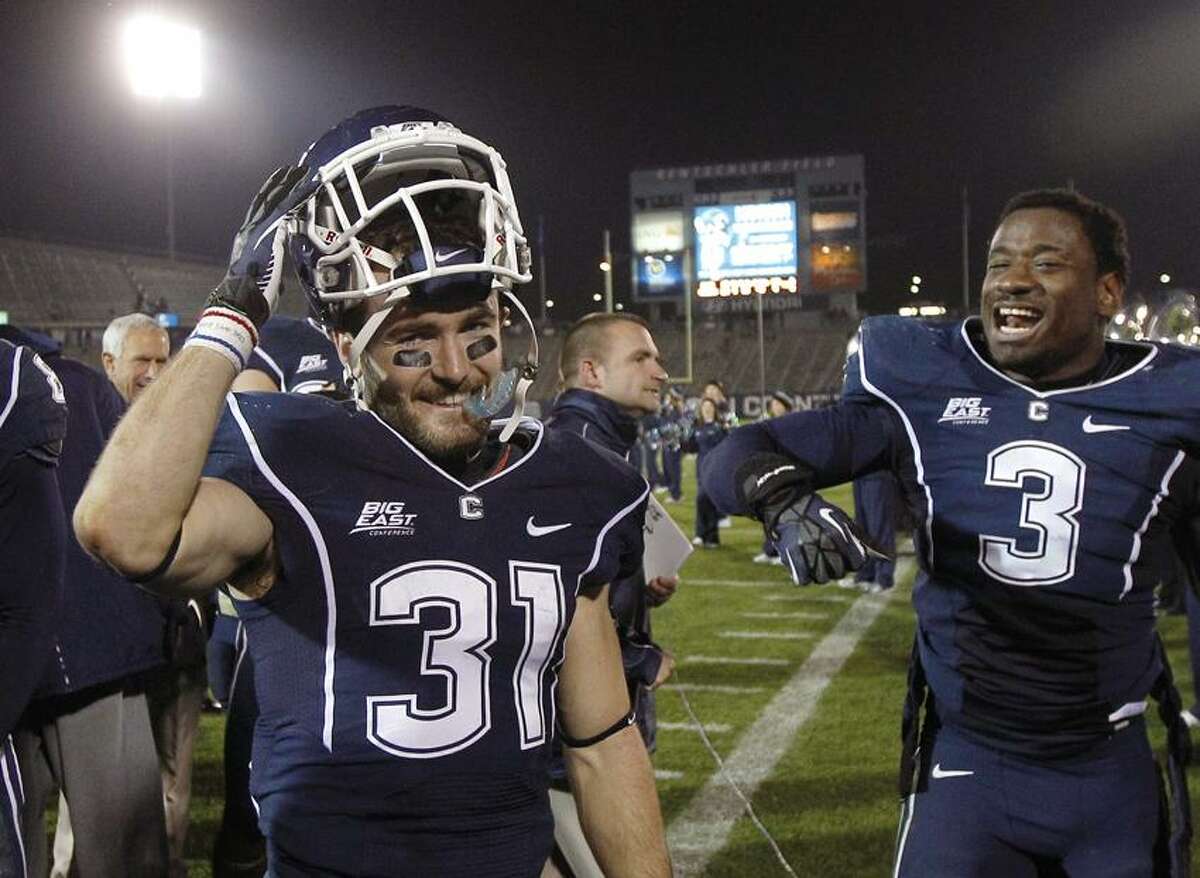 School officials: McCombs off UConn football team