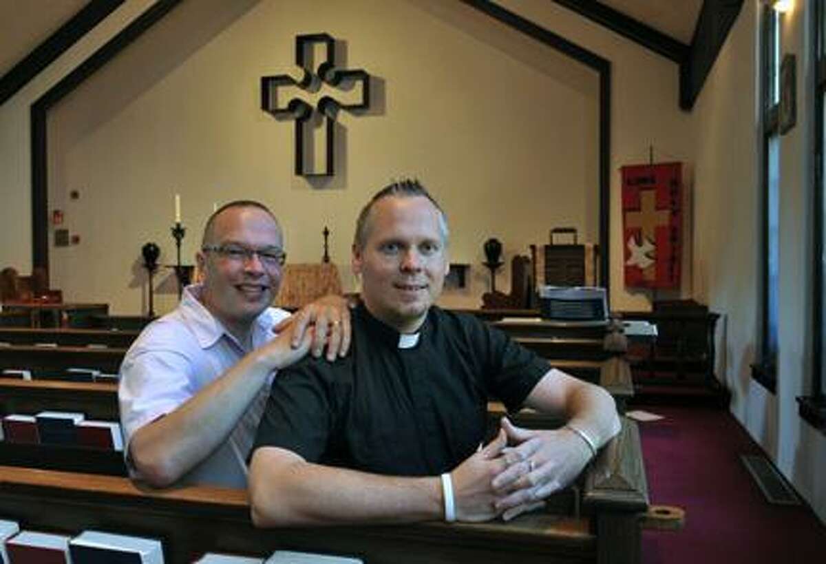 AP Photo by Kathy KmonicekThe Rev. Christopher D. Hofer, right, and his partner of 17 years, Kerry Brady at Hofer's parish, the Episcopal Church of St. Jude on Thursday, July 14, 2011 in Wantagh, N.Y., where they plan to wed in August. As more states legalize same-sex marriage, religious groups with ambiguous policies on homosexuality are divided over whether they should allow the ceremonies in local congregations. The decision is especially complex in the mainline Protestant denominations that have yet to fully resolve their disagreements over the Bible and homosexuality.