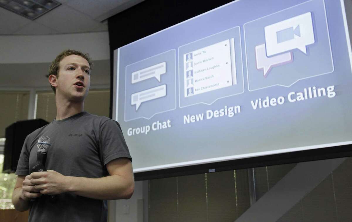 Facebook CEO Mark Zuckerberg talks about Video Calling, Group Chat and a new design during an announcement at Facebook headquarters in Palo Alto, Calif., Wednesday. (AP Photo/Paul Sakuma)