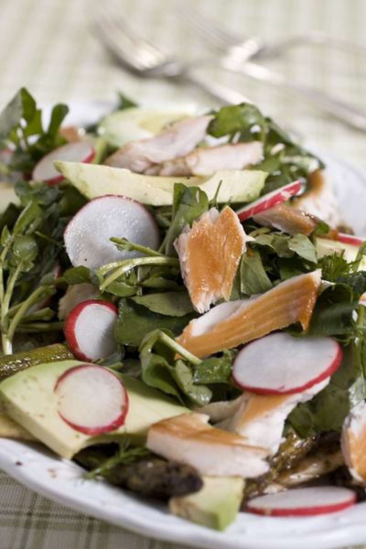 Larry Crowe/Associated Press photo: Marinated Spring Vegetables and Smoked Trout Salad