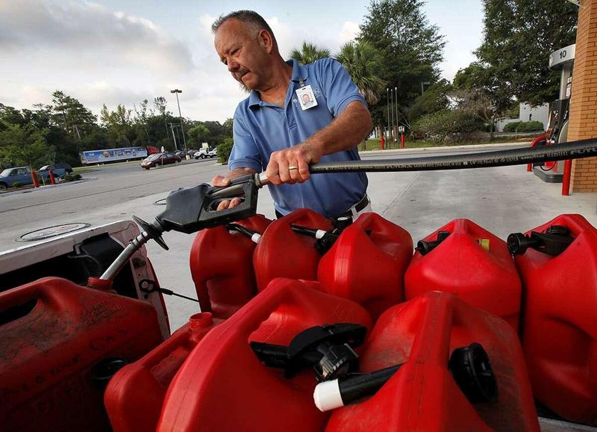 "I think the retailers will jack up prices overnight. We'll go through the gas anyway," said Plantation Resort landscaping manager Chris Jaeger as he filled his truck and 10 5-gallon gas containers Tuesday in Garden City, S.C. He said they gassed up their vehicles Monday and just want to be prepared in case Hurricane Irene hits the area. Associated Press