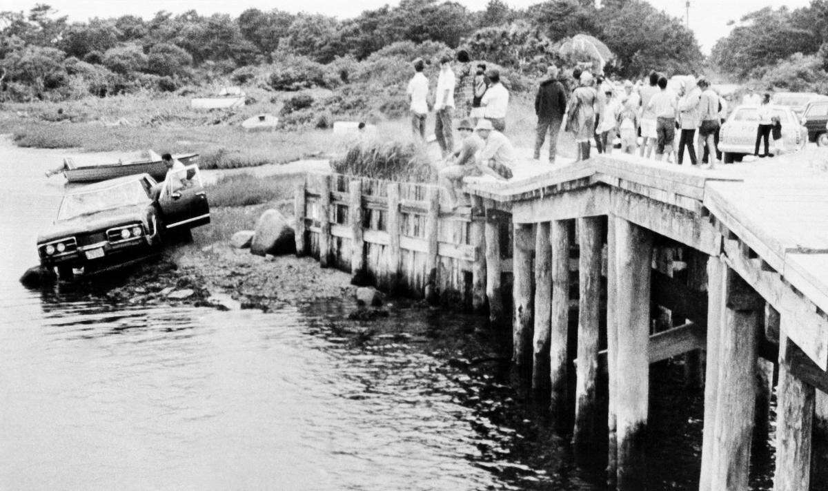Sen. Edward Kennedys car is pulled from water as the car is screened off the bridge at Edgartown, July 19, 1969, Edgartown, Mass. The body of Mary Kopechne of Washington, D.C., was found in rear seat. Her death was attributed to drowning. (AP Photo)