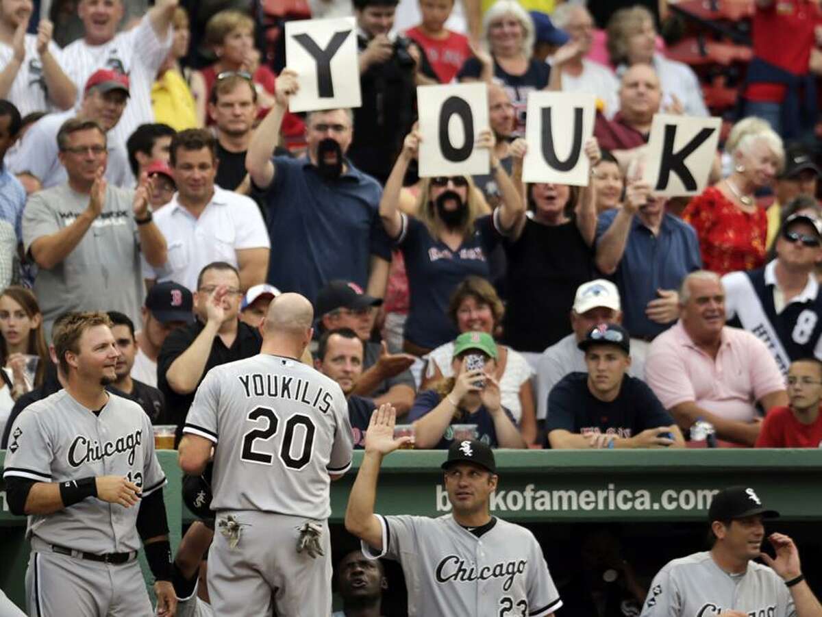 Boston Red Sox first baseman Kevin Youkilis throws the ball to the