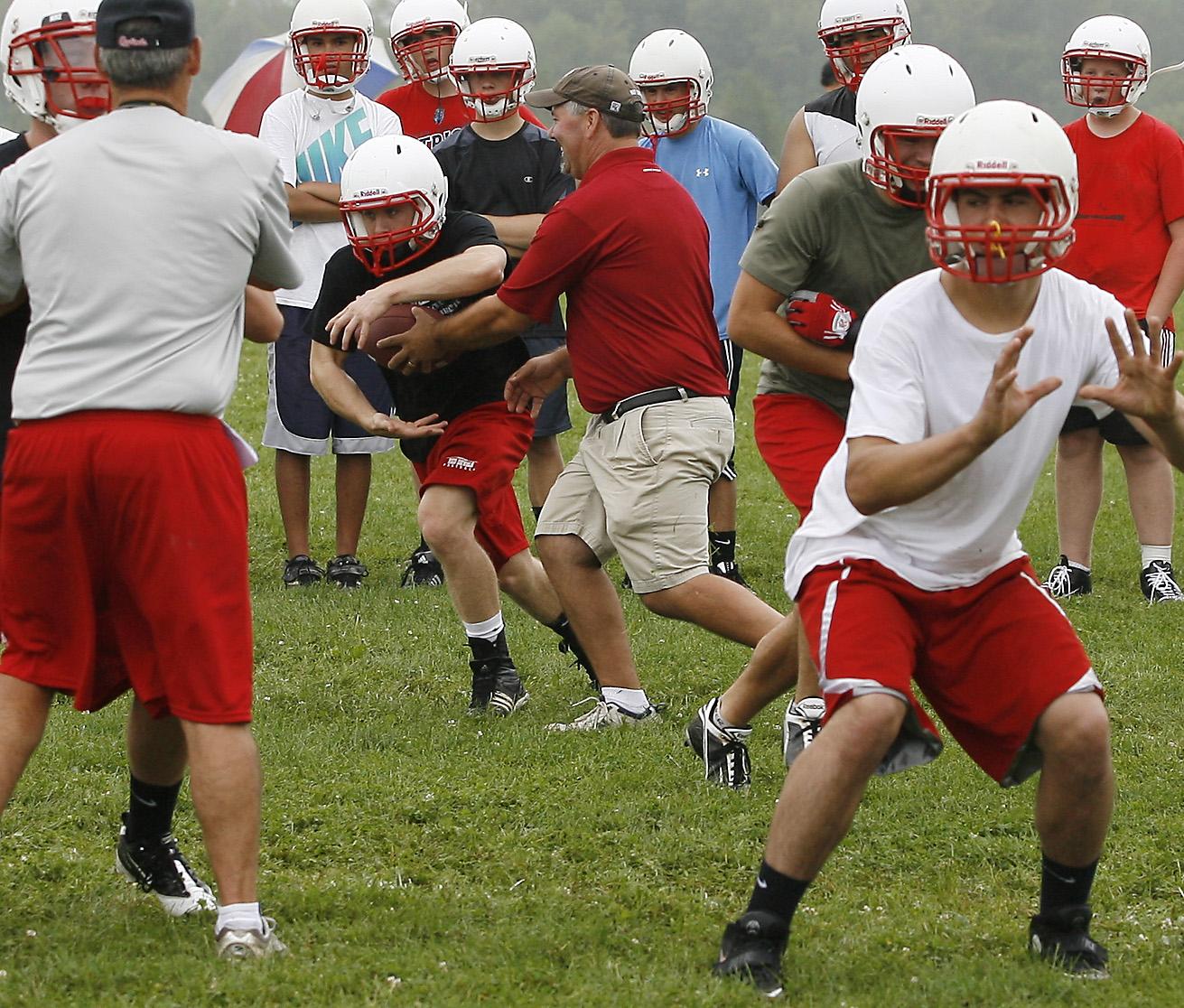 High School Football Practices Kick Off 2011 Season