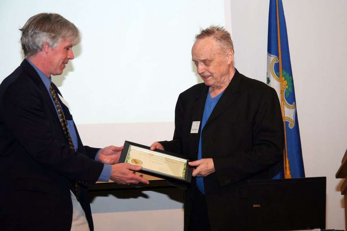 Mike Horn/NHBC photo: CAUSE TO CROW: Richard English, the New Haven Bird Club's longest-serving member at 65 years, right, received the Connecticut Ornithological Association's President's Award from CT Audubon's Patrick Comins, outgoing COA president. The award was presented April 9 at the annual COA meeting at Middlesex Community College. English, who joined as a junior member in 1946 at age 11, is a former president of the NHBC. The city resident's birding accomplishments are legendary and include several Connecticut First Records, donating the Richard English Bird Sanctuary in Killingworth to the Boy Scouts and also repairing the BSA Deer Lake Dam. He has taught many people to bird over the decades. TAKE YOUR BEST SHOT Readers are invited to send their nature photos and comments to features@nhregister.com or post them on our Facebook fan page, www.facebook.com/newhavenregister