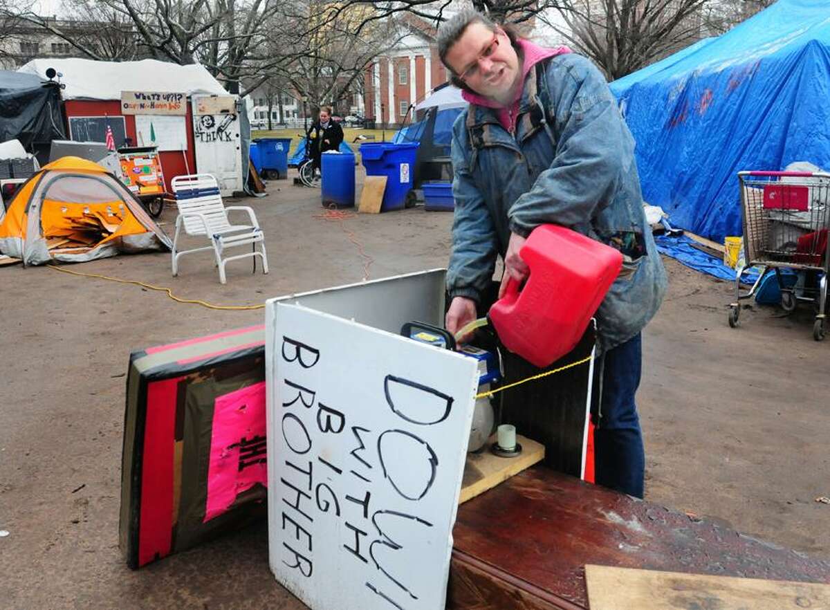 fillis a generator after it almost ran out of gas. The recent nights have been cold and damp. Occupy New Haven is the last group of size left occupying in New England. Melanie Stengel/Register