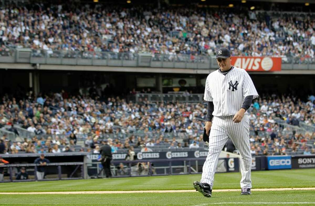 New York Yankees starting pitcher Freddy Garcia is pulled from a baseball game during the second inning against the Detroit Tigers, Saturday, April 28, 2012, in New York. (AP Photo/Julio Cortez)