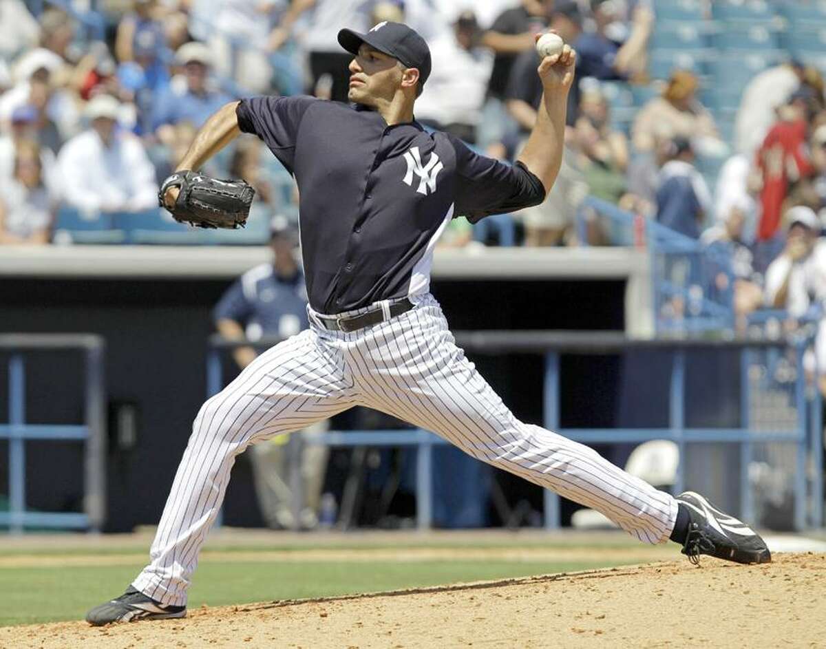 New York Yankees starting pitcher Andy Pettitte delivers against the New York Mets during a spring training baseball game at Steinbrenner Field in Tampa, Fla., Wednesday, April 4, 2012. It was Pettitte's first appearance in a spring training game after coming out of retirement to rejoin the Yankees. (AP Photo/Kathy Willens)