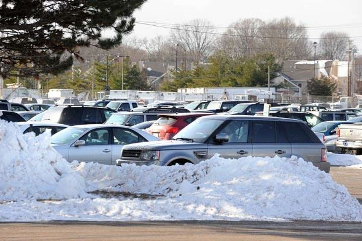 The city may start assessing fees on parking lots such as this one at the Sargent Manufacturing Co. on Sargent Drive in New Haven. (VM Williams/Register)