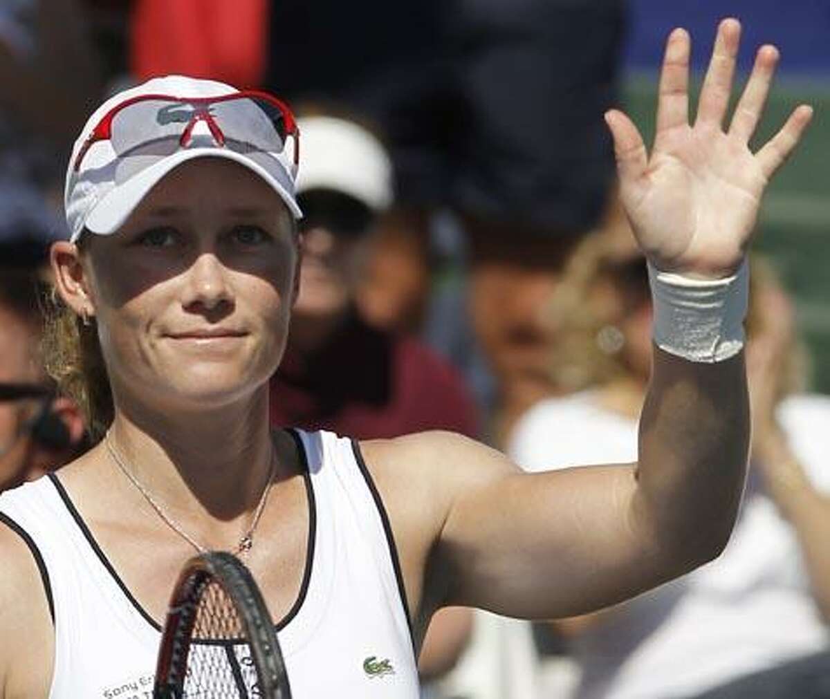 Samantha Stosur, of Australia, waves after her win against Melanie Oudin during the Mercury Insurance Open tennis tournament in Carlsbad, Calif., Wednesday, Aug. 4, 2010. (AP Photo/Chris Carlson)