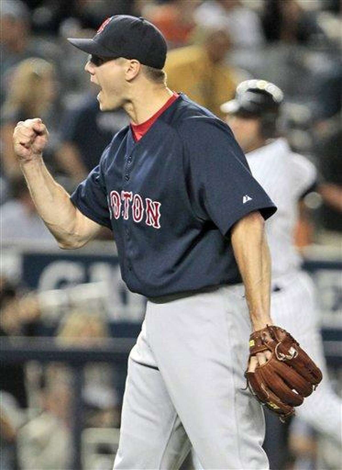 Boston Red Sox relief pitcher Jonathan Papelbon reacts after the final out of a baseball game against the New York Yankees, Friday, Aug. 6, 2010, in New York. The Red Sox won the game 6-3. (AP Photo/Frank Franklin II)