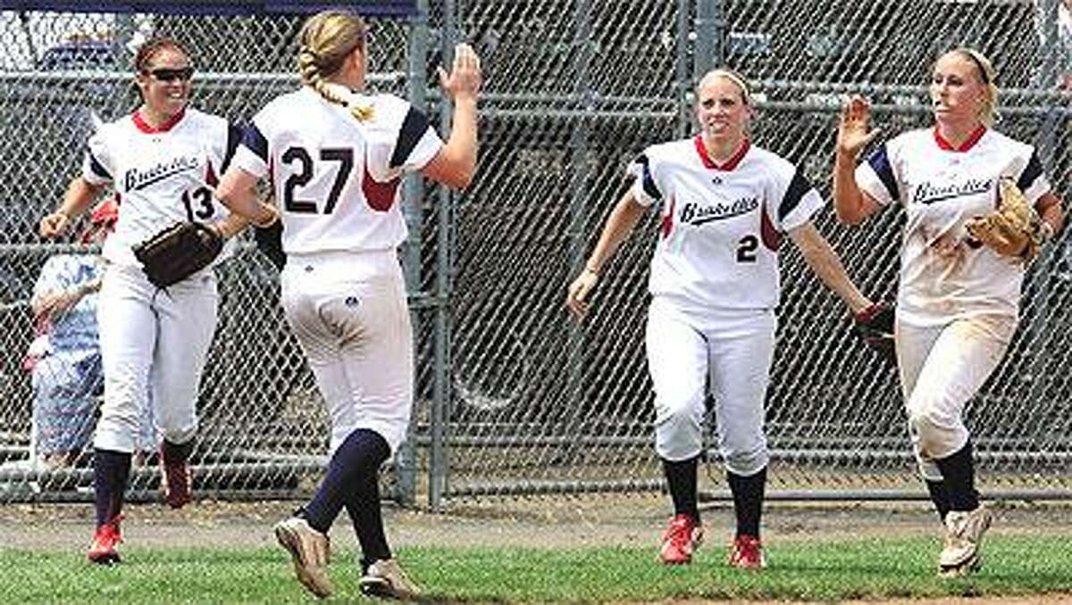 Stratford Brakettes pitcher Rachele Fico, second from left, celebrates with teammates Lindsey Bright, left, Mandie Fishback, second from right, and Jessica Mouse after beating the St. Louis Saints to win the Women's Major Softball National Championship on Sunday in West Haven. (Mara Lavitt/Register)