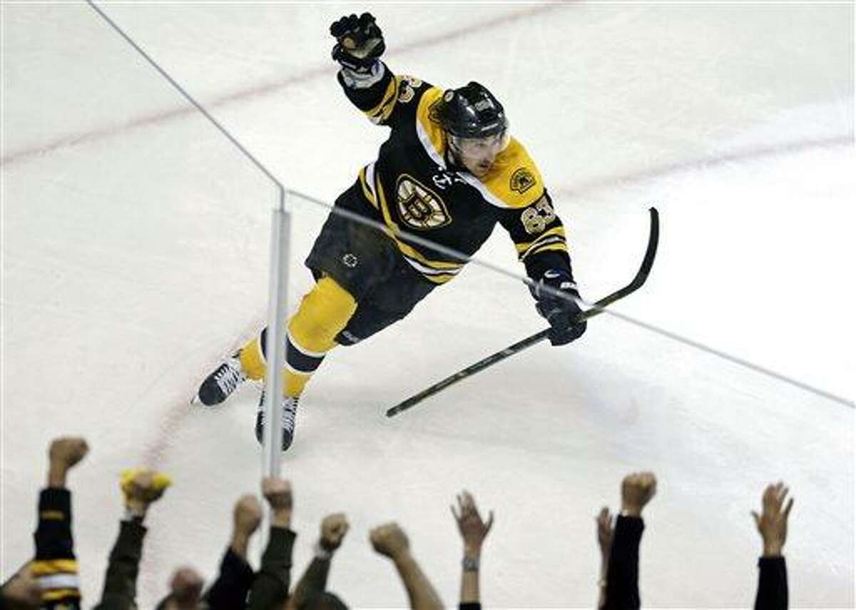 Pittsburgh Penguins' Andrew Ference (7) celebrates his game