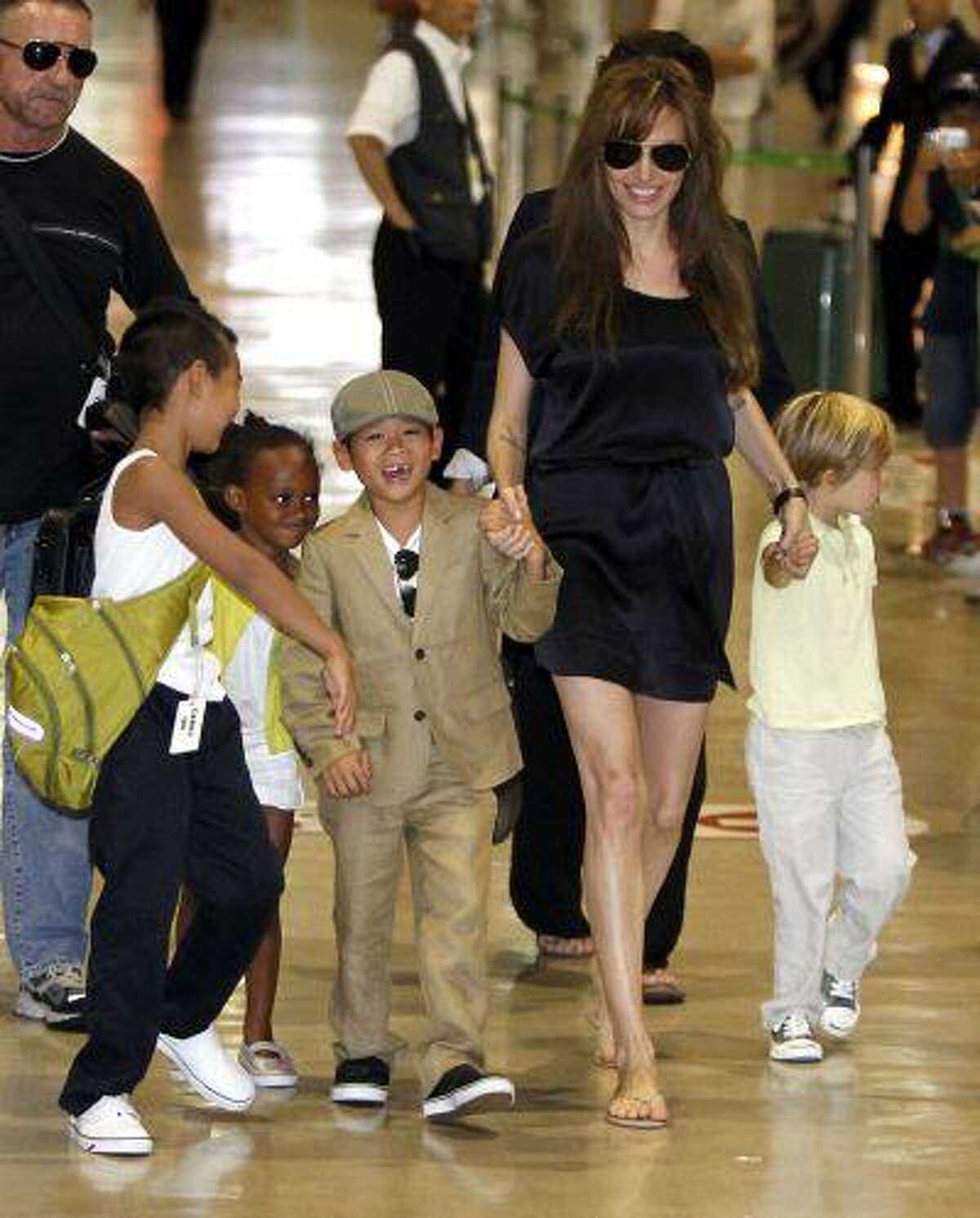 Brad Pitt and Angelina Jolie Arrive At Tokyo Airport With The Family In Tow