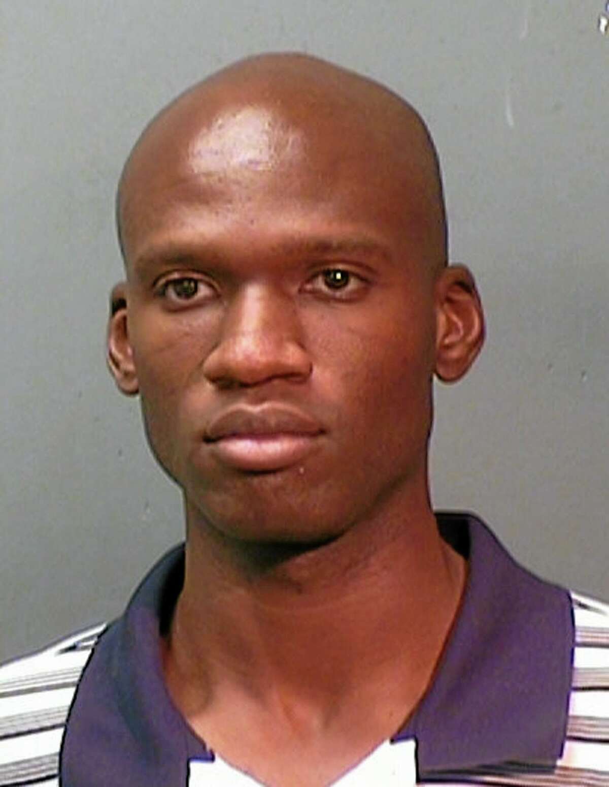 This booking photo provided by the Fort Worth Police Department shows Aaron Alexis, arrested in September, 2010, on suspicion of discharging a firearm in the city limits. The FBI has identified Alexis, 34, as the gunman in the Monday, Sept. 16, 2013 shooting rampage at at the Washington Navy Yard in Washington that left thirteen dead, including himself. (AP Photo/ Fort Worth Police Department)