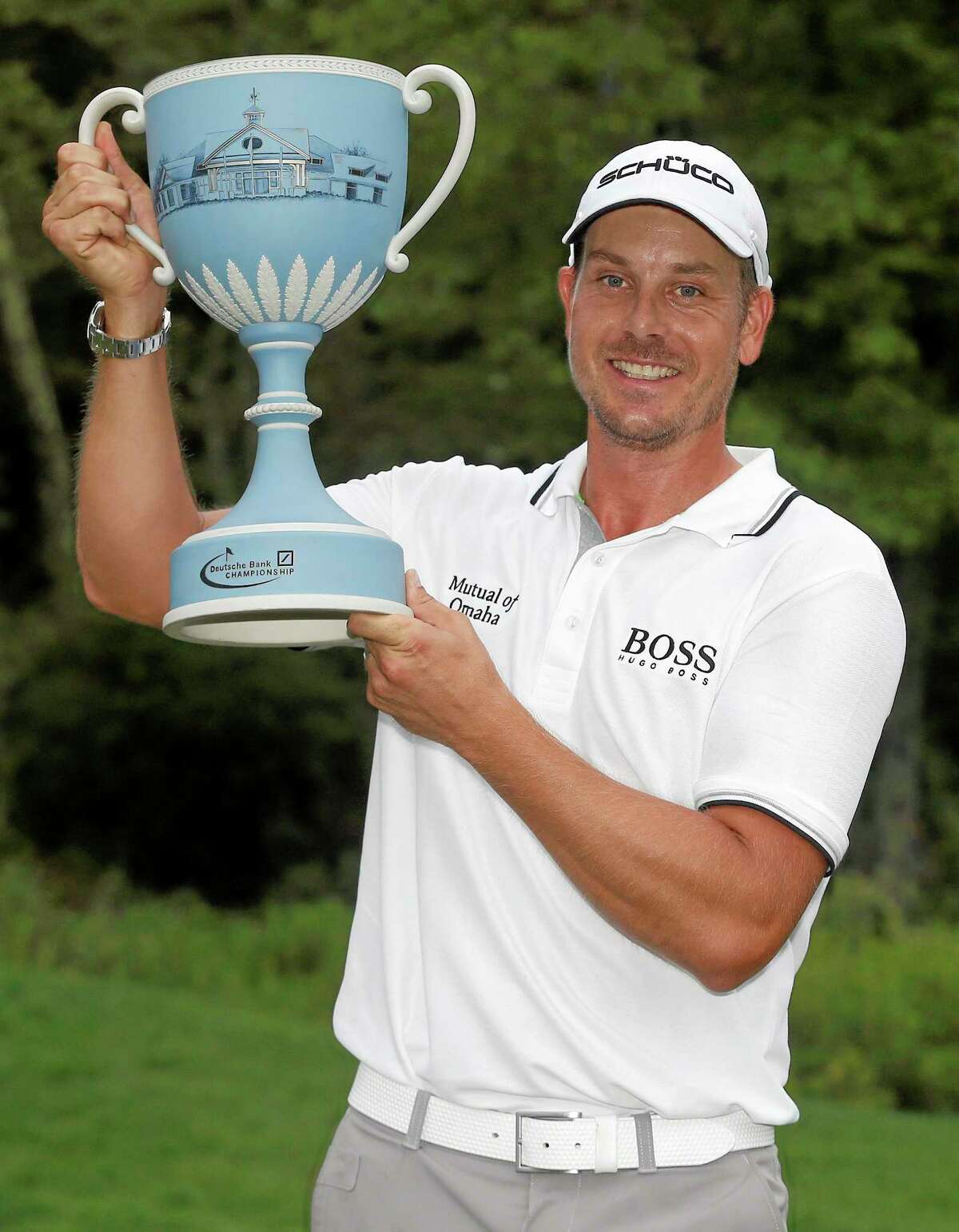 Henrik Stenson poses with the trophy after winning the Deutsche Bank Championship in Norton, Mass., on Monday.