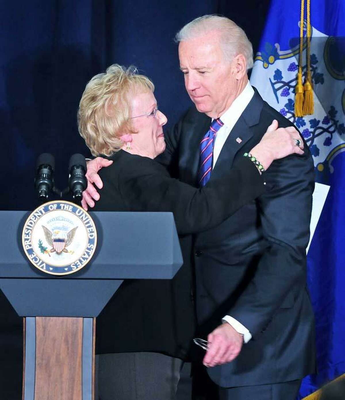 Newtown First Selectman E. Patricia Llodra (left) embraces Vice President Joe Biden (right) before he speaks at a Conference on Gun Violence at the Campus Center Ballroom at Western Connecticut State University in Danbury on 2/21/2013.Photo by Arnold Gold/New Haven Register