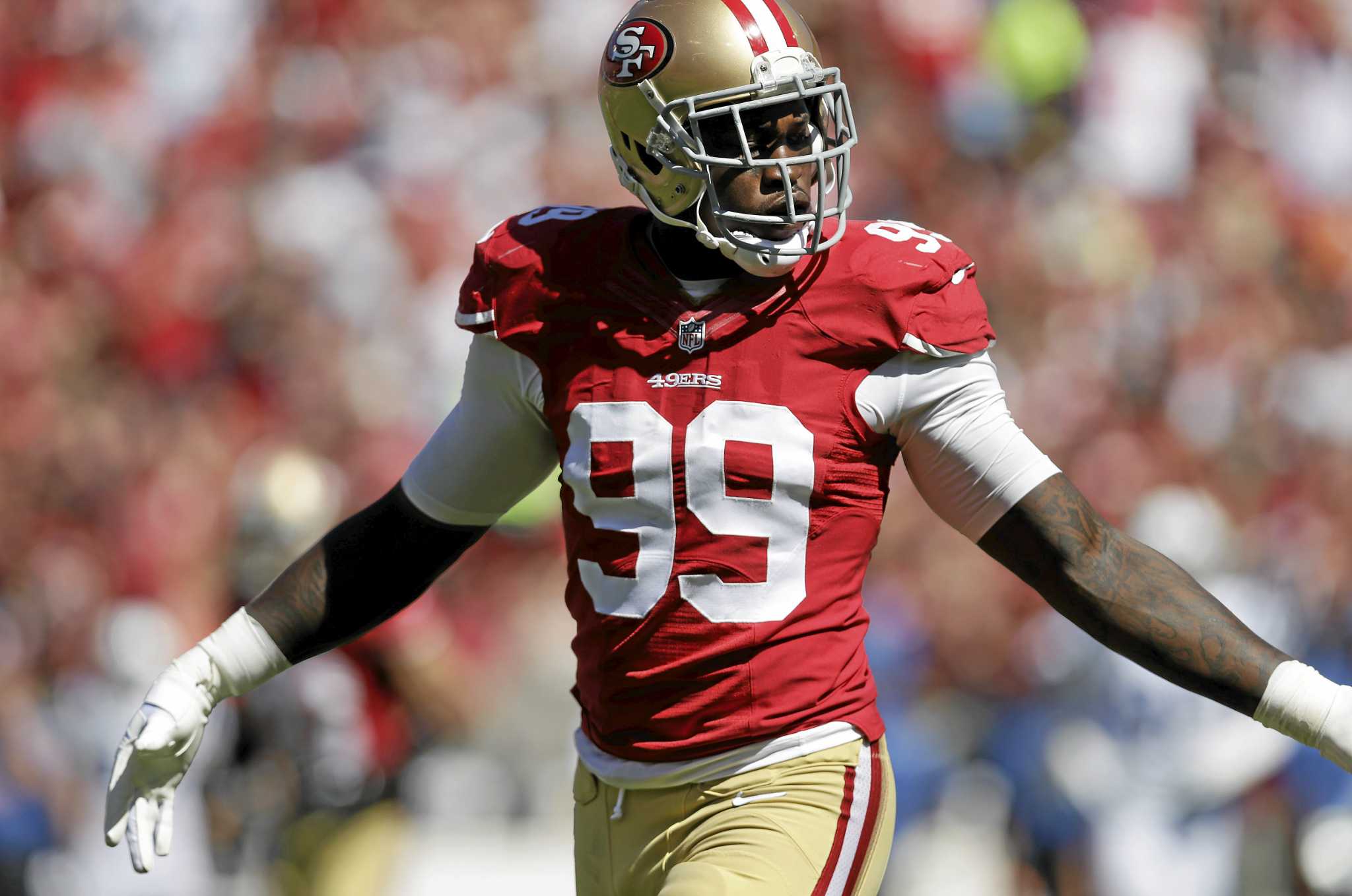 San Francisco 49ers linebacker Aldon Smith (99) celebrates during the third  quarter of an NFL football game against the Arizona Cardinals in San  Francisco, Sunday, Dec. 30, 2012. (AP Photo/Marcio Jose Sanchez