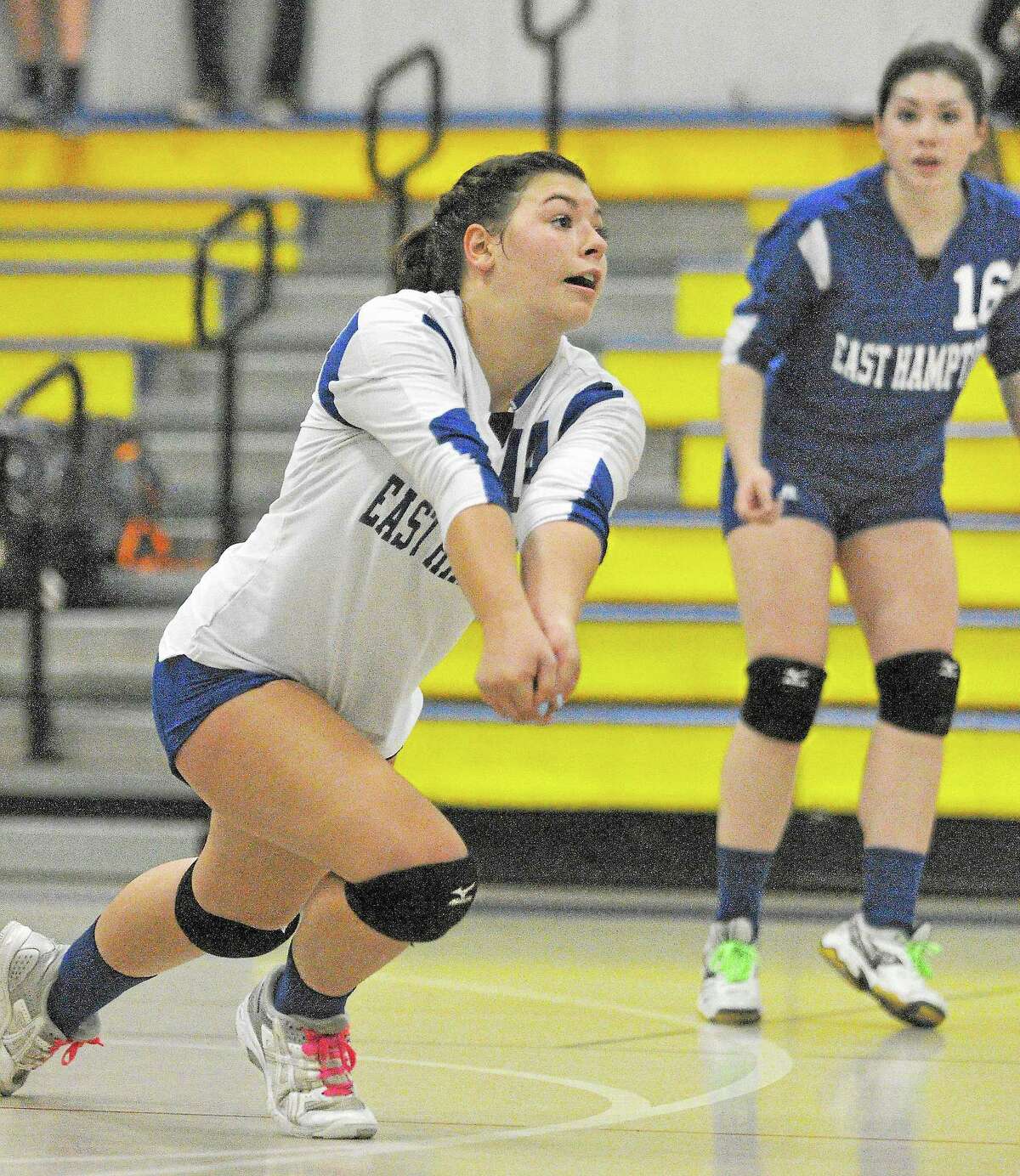 Catherine Avalone — The Middletown Press East Hampton’s Grace Fales gets ready to bump the ball against Haddam-Killingworth in a Shoreline Semifinal game Thursday afternoon in Higganum. East Hampton won 3-1.