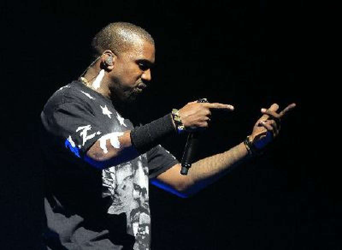 Kanye West performs at the Throne concert at HP Pavilion in San Jose, Calif. on Wednesday, December 14, 2011.