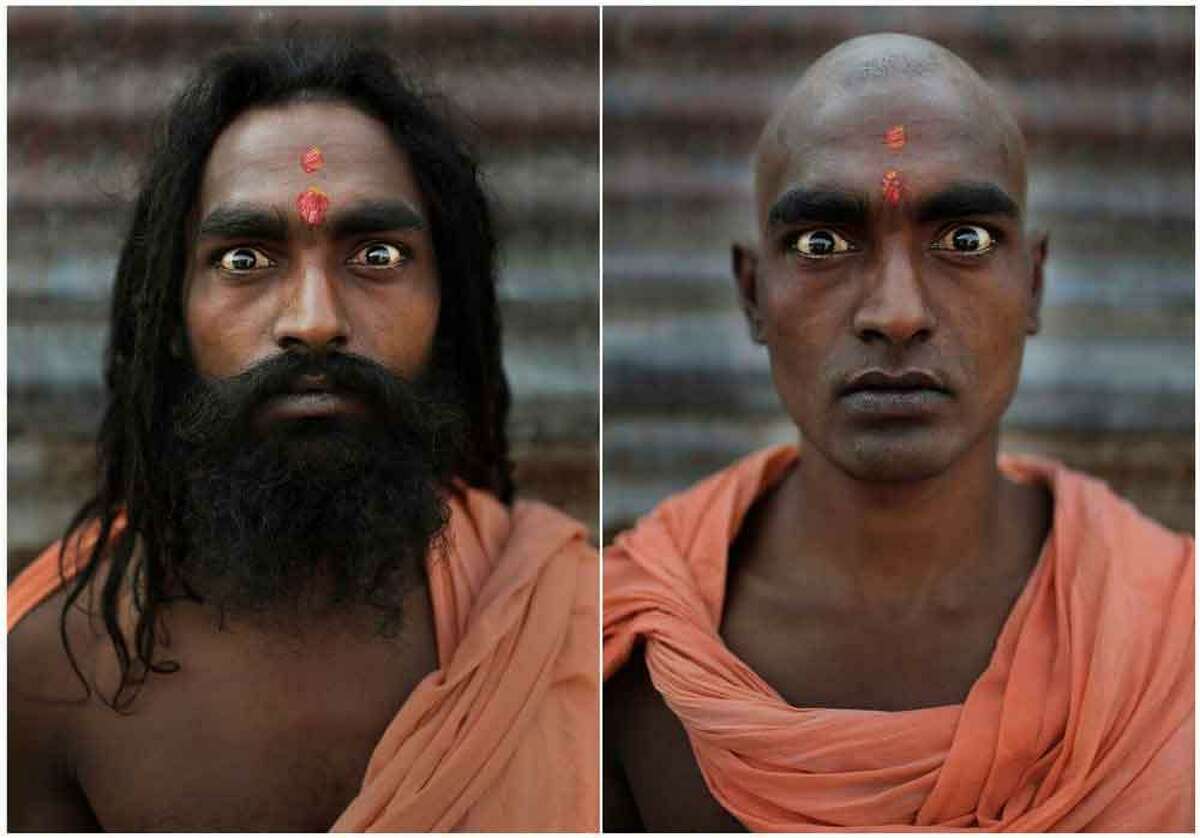 In this combination of two photos taken Wednesday, Feb. 13, 2013, Hindu holy man Baba Sanjay poses before, left, and after, right, he had his head and face shaved as part of an initiation ritual where he was to become a Naga Sadhu, or naked holy man, at the Maha Kumbh Festival at Sangam, the confluence of the holy rivers Ganges, Yamuna and mythical Saraswati, in Allahabad, India. The initiation of new Naga Sadhus can only be performed at the Kumbh Mela in Allahabad, which occurs once every 12 years and sees millions of devotees converging on the northern Indian city. (AP Photo/Kevin Frayer)