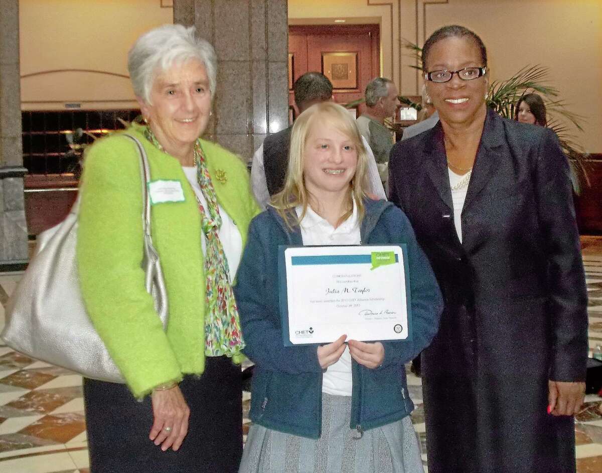 Left to right, Sister Mary McCarthy, Mercy High student Julia Taylor and state Treasurer Denise Nappier.