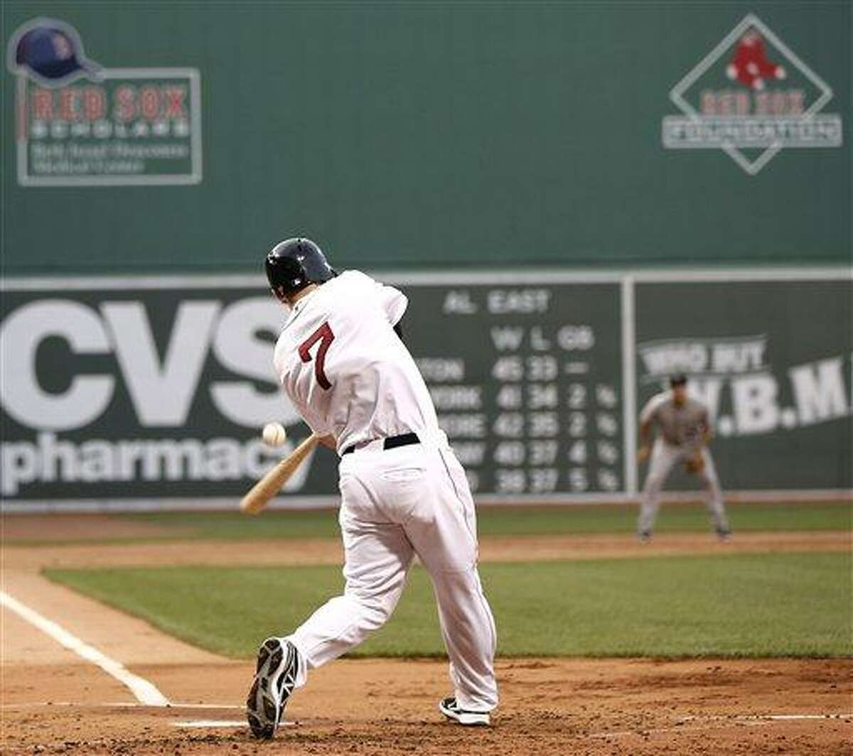Boston Red Sox's Stephen Drew swings at a pitch during the first inning of a baseball game against the Colorado Rockies at Fenway Park in Boston Tuesday, June 25, 2013. (AP Photo/Winslow Townson)