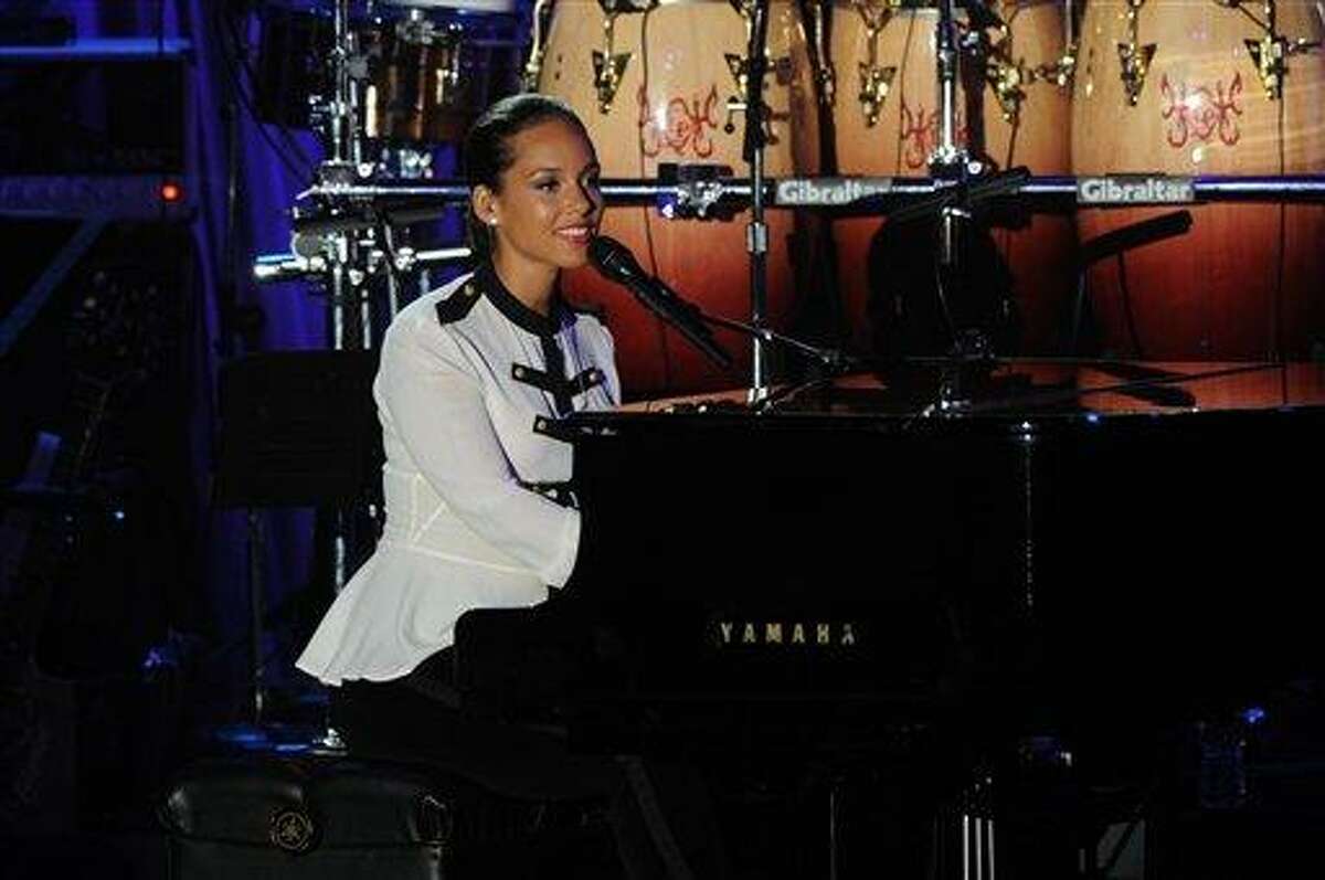 Alicia Keys performs onstage at the Pre-GRAMMY Gala & Salute to Industry Icons with Clive Davis honoring Richard Branson, Saturday in Beverly Hills, Calif. Associated Press