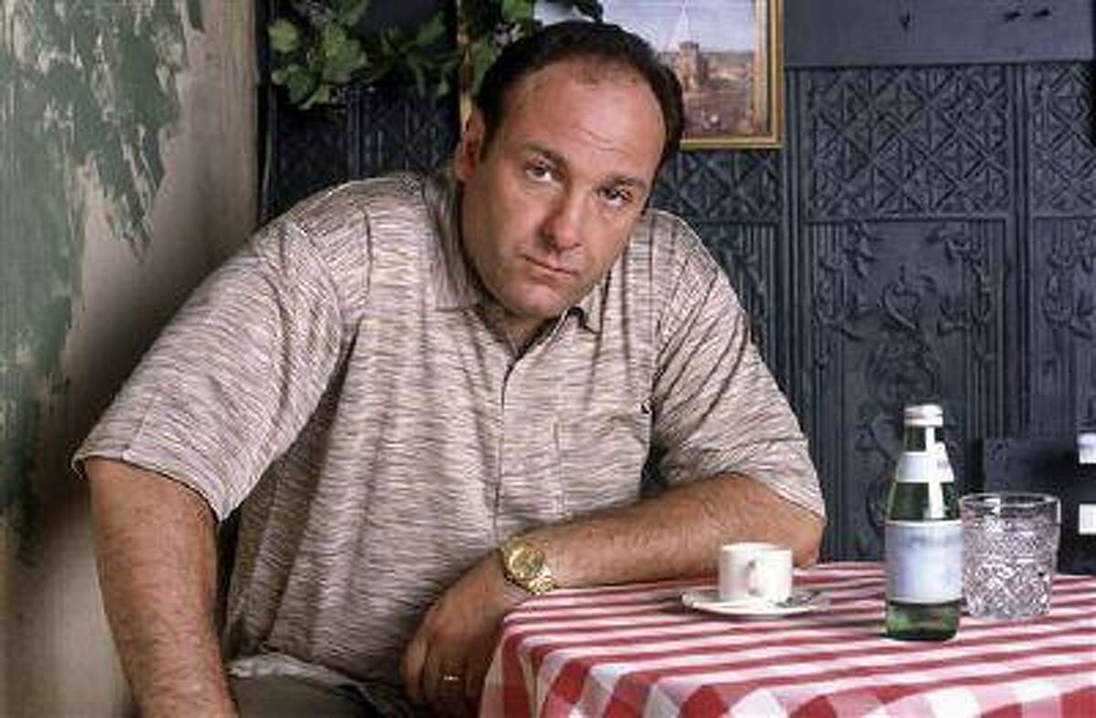 This 1999 photo provided by HBO, shows James Gandolfini as mob boss Tony Soprano, in an episode from the first season of the HBO cable television mob series, "The Sopranos." HBO and the managers for Gandolfini say the actor died Wednesday, June 19, 2013, in Italy. He was 51. (AP Photo/HBO, Anthony Neste/File)