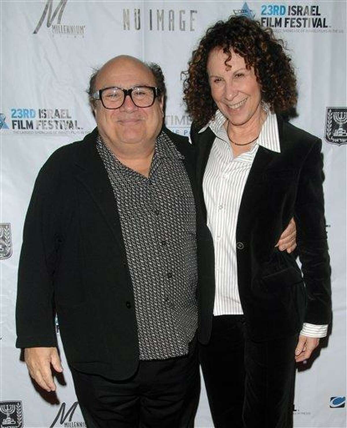 Actors Danny Devito, left, and Rhea Perlman attend the opening night of the 23rd Annual Israel Film Festival at the Ziegfeld Theatre in New York in 2008. A spokesman for DeVito says the couple is separating after 30 years of marriage. Publicist Stan Rosenfield offered no other details. Associated Press