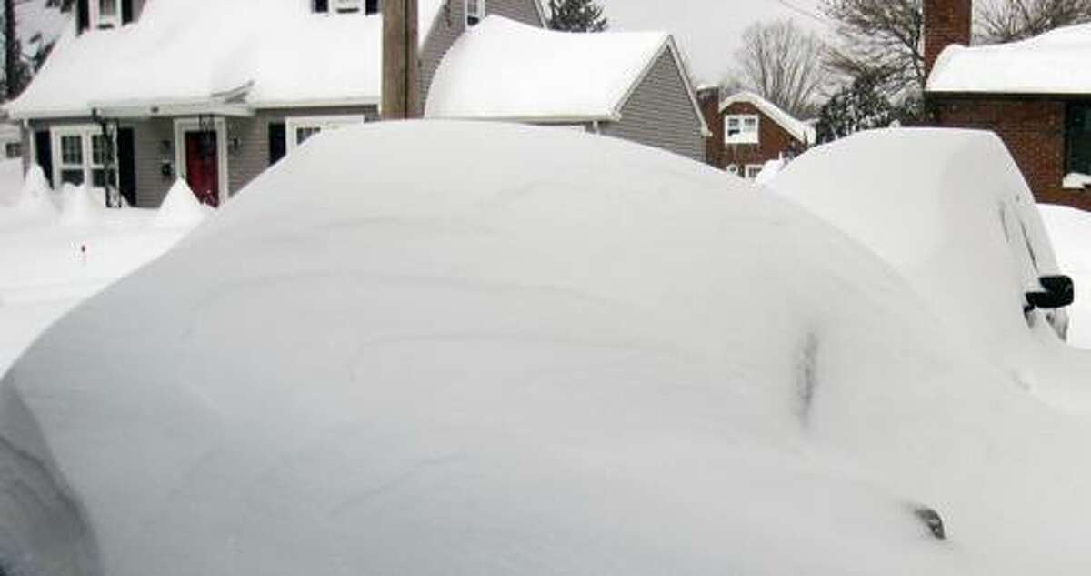 Submitted by Robert Avalone The view on Saturday of the snow covered autos in my driveway.