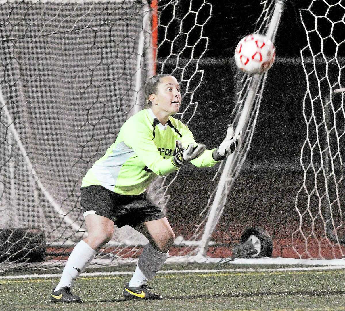 Branford goalkeeper Becca Vitale makes a save during an SCC semifinal win over Mercy.