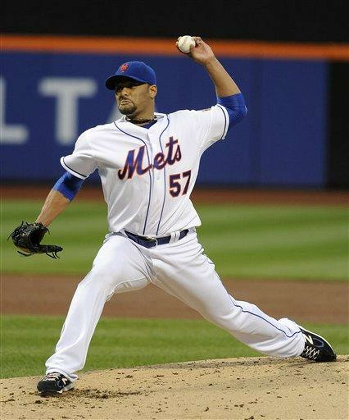 New York Mets starting pitcher Johan Santana (57) throws against the St. Louis Cardinals in the second inning of a baseball game on Friday, June 1, 2012, at Citi Field in New York. (AP Photo/Kathy Kmonicek)