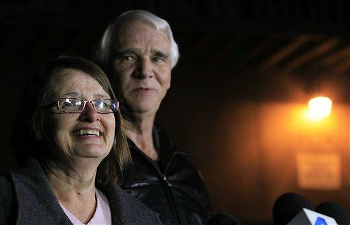 Jim Reynolds, 66, right, and wife, Karen Reynolds 57, recount their experience during a news conference Wednesday, Feb. 13, 2013, in Big Bear Lake, Calif., of being held captive by fugitive Christopher Dorner inside a condo unit they own at Mountain Vista Resort. AP Photo/Los Angeles Times, Brian van der Brug