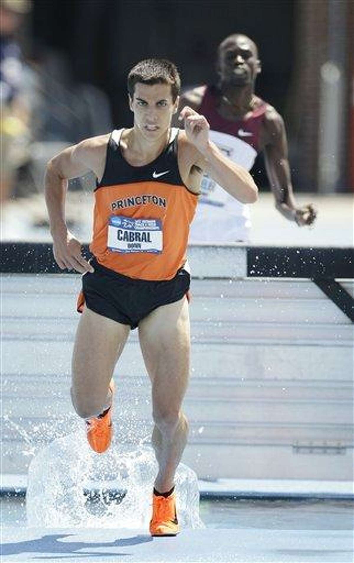 Princeton's Donn Cabral leads during the final lap of the men's 3,000-meter steeplechase at the NCAA outdoor track and field championships, Saturday, June 9, 2012, at Drake Stadium in Des Moines, Iowa. (AP Photo/Charlie Neibergall)
